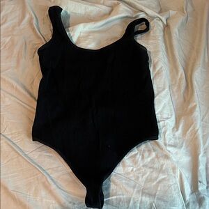 Colsie Black Ribbed One-Piece Bodysuit